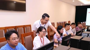 Vận hành thử nghiệm chính quyền địa phương 2 cấp tại phường Hoàn Kiếm. (Ảnh: QUANG THÁI)