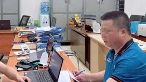 Ông Bùi Trường Sơn tại Cơ quan Công an. (Ảnh: TTXVN)