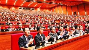 Các đại biểu đến dự Đại hội Đảng toàn quốc lần thứ XIV. (Ảnh HẢI LINH)