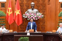 Thủ tướng Phạm Minh Chính chủ trì cuộc họp của Thường trực Chính phủ về khắc phục hậu quả thiên tai sau bão số 11. (Ảnh: TRẦN HẢI)