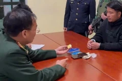 Đối tượng và số vàng tang vật.