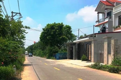 Tuyến đường liên xã qua địa bàn xã Đồng Phú (huyện Chương Mỹ, thành phố Hà Nội) - xã vừa được công nhận đạt chuẩn nông thôn mới nâng cao. (Ảnh: MINH VÂN)