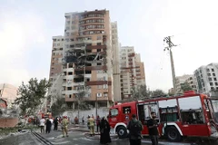 Một tòa nhà ở thủ đô Tehran (Iran) hư hại sau đợt không kích.