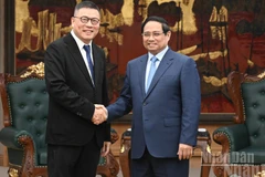 Thủ tướng Chính phủ Phạm Minh Chính và ông Hồng Thiên Chúc, Chủ tịch Tập đoàn Texhong (Trung Quốc). (Ảnh: Trần Hải)