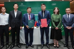 Cơ quan Thương mại và Đầu tư Chính phủ Australia (Austrade) đã ký Biên bản ghi nhớ với Hiệp hội Ngân hàng Việt Nam. (Ảnh: HẢI YẾN)
