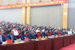 Các đại biểu dự Lễ công bố Nghị quyết của Quốc hội, Ủy ban Thường vụ Quốc hội về việc kết thúc hoạt động đơn vị hành chính cấp huyện, sắp xếp các đơn vị hành chính cấp xã tại Sơn La.