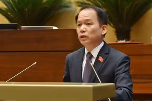 Bộ trưởng Tư pháp Hoàng Thanh Tùng giải trình trước Quốc hội về các nội dung đại biểu quan tâm. (Ảnh: THỦY NGUYÊN) 