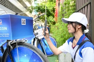 Hệ thống tín chỉ xanh P-Coin, hệ thống tín chỉ số nội bộ dành cho các hoạt động như đạp xe, nhặt rác, trồng cây hay hiến máu tình nguyện... (Ảnh: MINH VÂN)