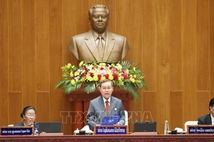 Đồng chí Xaysomphon Phomvihane, Ủy viên Bộ Chính trị, Chủ tịch Quốc hội khóa IX của Lào phát biểu khai mạc Kỳ họp. (Ảnh: Xuân Tú/PV TTXVN tại Lào)