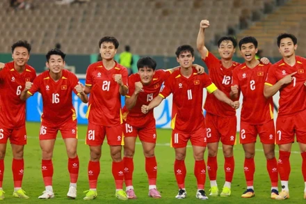 Đội tuyển U23 Việt Nam ăn mừng chiến thắng trong lượt trận vòng bảng tại Giải U23 châu Á. (Ảnh: Diệp Sơn Nam)
