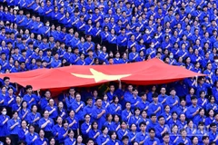 Gần chín nghìn tình nguyện viên Thủ đô phục vụ sự kiện A80 có mặt tại sân vận động Hàng Đẫy (Hà Nội).