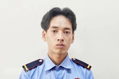 Đối tượng Lý Hoàng Nam tại cơ quan công an. 