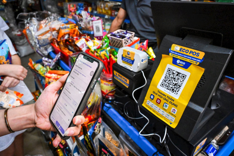 Nền tảng ECO POS giúp số hóa toàn bộ chuỗi cung ứng từ nhà sản xuất, nhãn hàng đến nhà phân phối và tiệm tạp hóa truyền thống. (Ảnh THÀNH ĐẠT) ok6.jpg