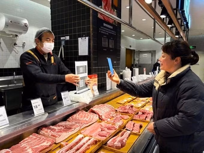 Tại Trung Quốc, từ miếng thịt, bó rau hay củ hành đều có mã vạch, tạo thuận lợi cho các hộ kinh doanh hoàn thiện hồ sơ thuế. (Nguồn THX)