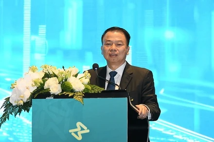 Thứ trưởng Bộ Tài chính Nguyễn Đức Chi phát biểu tại hội nghị. Ảnh: DUY GIANG 