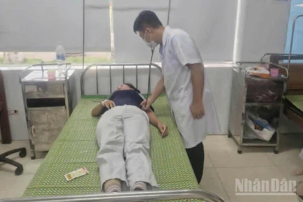 Công nhân Công ty Toyoda nhập viện sau bữa cơm tại bếp ăn tập thể của nhà máy ngày 7/8/2025.