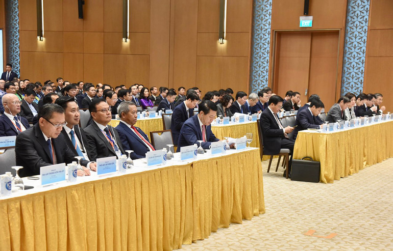 Các đại biểu hai nước Việt Nam và Lào tham dự hội nghị. Ảnh: TRẦN HẢI Các đại biểu hai nước Việt Nam và Lào tham dự hội nghị. Ảnh: TRẦN HẢI