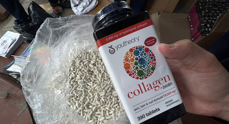 Một lọ thực phẩm chức năng bị các đối tượng làm giả.