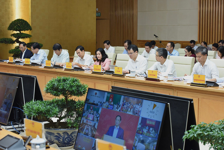 Các đại biểu tham dự phiên họp. (Ảnh: TRẦN HẢI)