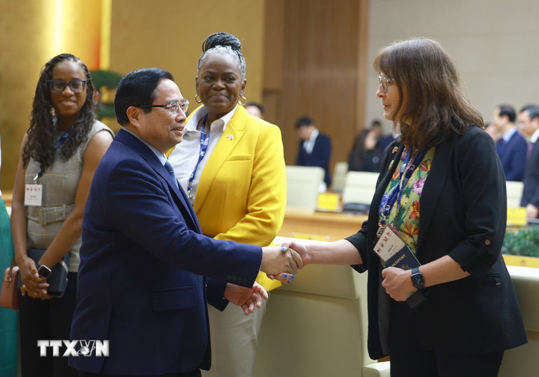 Thủ tướng Phạm Minh Chính với lãnh đạo các Trường Đại học của Hoa Kỳ sang Việt Nam dự Chương trình Hợp tác Học thuật Quốc tế (IAPP).