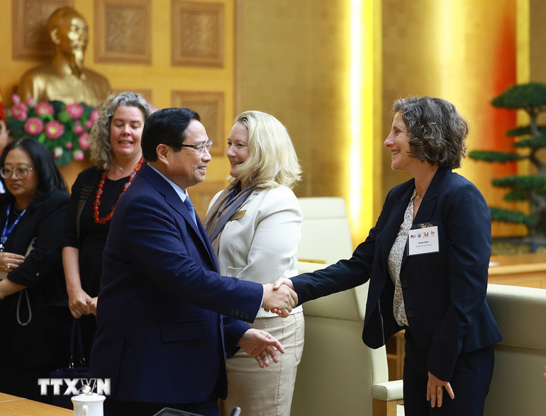 Thủ tướng Phạm Minh Chính với lãnh đạo các Trường Đại học của Hoa Kỳ sang Việt Nam dự Chương trình Hợp tác Học thuật Quốc tế (IAPP).