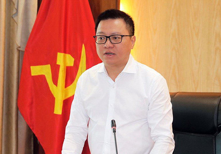 Đồng chí Lê Quốc Minh phát biểu ý kiến tại cuộc họp.