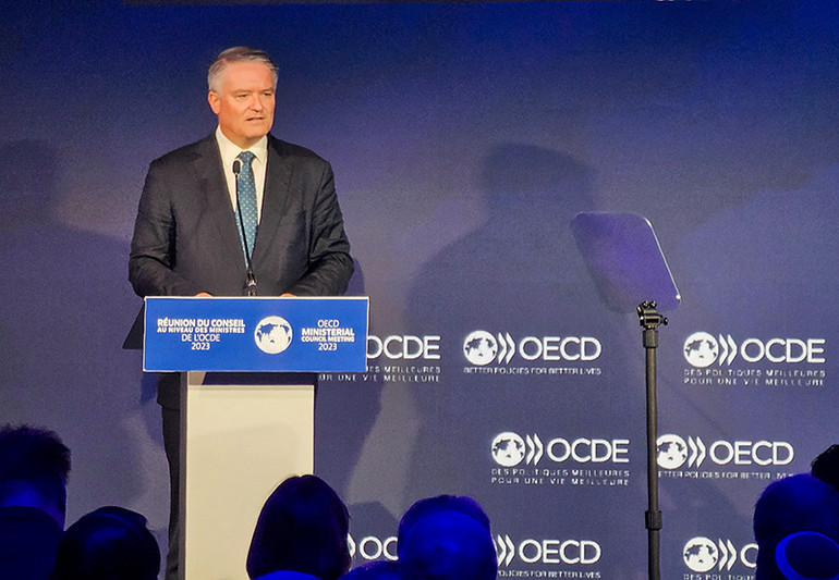 Tổng thư ký OECD Mathias Cormann phát biểu khai mạc hội nghị. (Ảnh: MINH DUY)