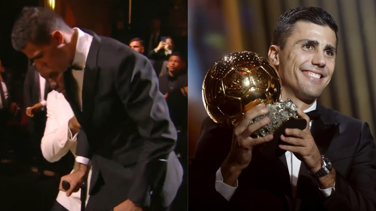 Rodri bước lên bục trao giải với chiếc nạng. (Ảnh: Getty)