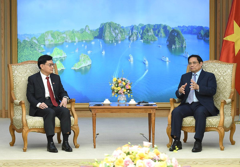 Thủ tướng Phạm Minh Chính và Phó Thủ tướng Singapore Vương Thụy Kiệt tại buổi tiếp. Thủ tướng Phạm Minh Chính và Phó Thủ tướng Singapore Vương Thụy Kiệt tại buổi tiếp.