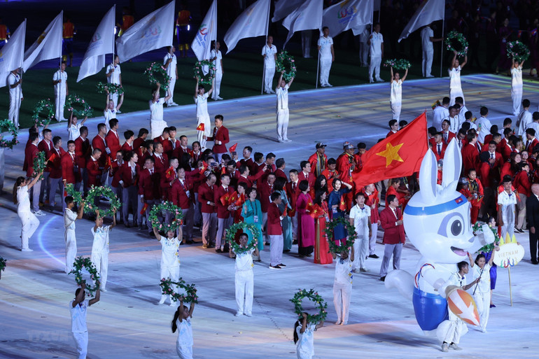 Đoàn thể thao Việt Nam tại Lễ khai mạc SEA Games 32. (Ảnh: TTXVN) Đoàn thể thao Việt Nam tại Lễ khai mạc SEA Games 32. (Ảnh: TTXVN)