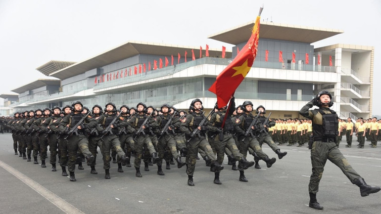 Lực lượng Cảnh sát cơ động diễu binh tại Lễ kỷ niệm. (Ảnh: Trần Hải)