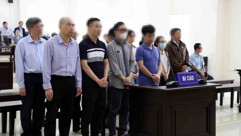 Các bị cáo tại phiên tòa xét xử. (Ảnh: Phạm Kiên/TTXVN) Các bị cáo tại phiên tòa xét xử. (Ảnh: Phạm Kiên/TTXVN)