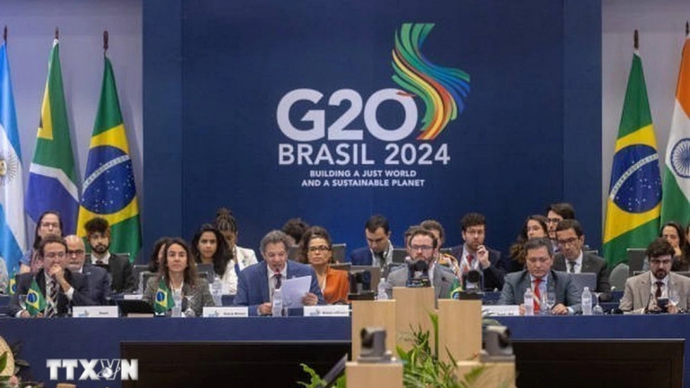 Các đại biểu tham dự Hội nghị Bộ trưởng Tài chính và Thống đốc Ngân hàng Trung ương G20 tại thành phố Rio de Janeiro, Brazil ngày 25/7/2024. (Ảnh: Getty Images/TTXVN) Các đại biểu tham dự Hội nghị Bộ trưởng Tài chính và Thống đốc Ngân hàng Trung ương G20 tại thành phố Rio de Janeiro, Brazil ngày 25/7/2024. (Ảnh: Getty Images/TTXVN)