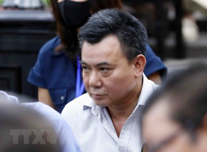 Bị cáo Nguyễn Anh Tuấn, cựu Phó Giám đốc Công an thành phố Hà Nội, nghe tòa tuyên án. (Ảnh: Phạm Kiên/TTXVN)