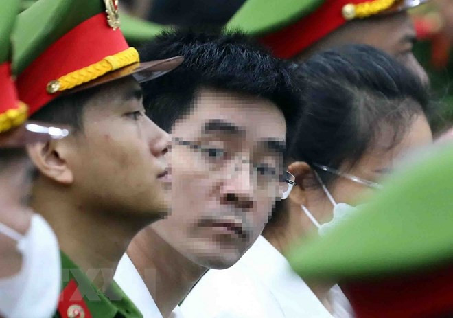 Bị cáo Hoàng Văn Hưng, cựu điều tra viên Cục An ninh điều tra, Bộ Công an, tại phiên tòa. (Ảnh: Phạm Kiên/TTXVN)