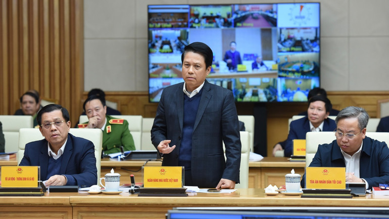 Đại diện lãnh đạo Ngân hàng Nhà nước Việt Nam phát biểu.