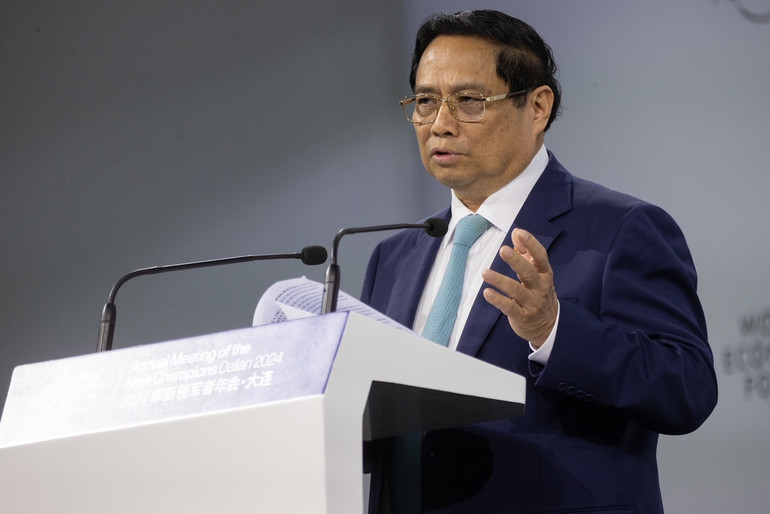 [Ảnh] Thủ tướng Phạm Minh Chính phát biểu khai mạc tại Phiên toàn thể Hội nghị WEF Đại Liên ảnh 1