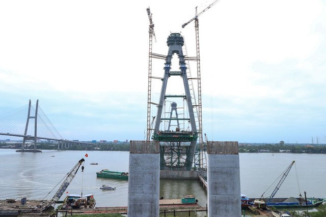 Cầu Mỹ Thuận 2 có tổng chiều dài khoảng 6,61km, bắc qua sông Tiền, đi qua địa bàn 2 tỉnh Tiền Giang và Vĩnh Long. (Ảnh: VGP/Nhật Bắc) Cầu Mỹ Thuận 2 có tổng chiều dài khoảng 6,61km, bắc qua sông Tiền, đi qua địa bàn 2 tỉnh Tiền Giang và Vĩnh Long. (Ảnh: VGP/Nhật Bắc)