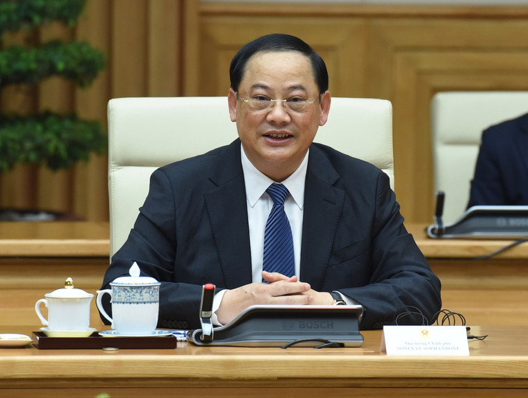 Thủ tướng Lào Sonexay Siphandone phát biểu tại buổi làm việc. (Ảnh: TRẦN HẢI)