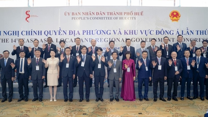 Các đại biểu chụp hình lưu niệm tại hội nghị.