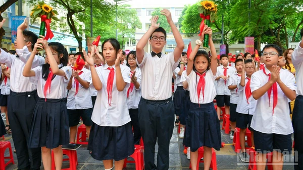 Học sinh Trường trung học cơ sở Hoàng Hoa Thám, Hà Nội, trong lễ khai giảng năm học mới. (Ảnh minh họa: THÀNH ĐẠT)