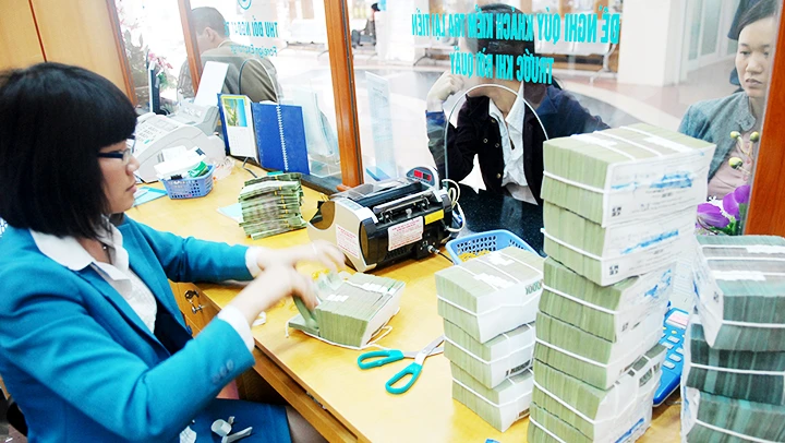 Nợ xấu có xu hướng gia tăng và tạo áp lực lớn lên các tổ chức tín dụng. Ảnh: NGUYỆT ANH