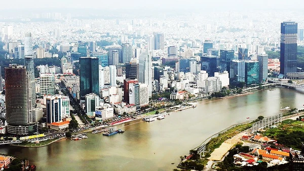 Hệ thống chính sách ổn định sẽ thúc đẩy tăng trưởng kinh tế, thu hút đầu tư và nâng cao đời sống người dân. Ảnh: ANH QUÂN