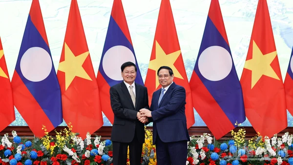 Thủ tướng Phạm Minh Chính đón Tổng Bí thư, Chủ tịch nước Lào Thongloun Sisoulith.