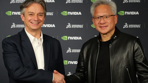 Pascal Daloz, Tổng Giám đốc điều hành Dassault Systèmes (trái) và ông Jensen Huang (phải), Nhà sáng lập kiêm Tổng Giám đốc điều hành NVIDIA ký hợp tác xây dựng kiến trúc AI công nghiệp.