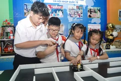 Thành phố Hồ Chí Minh miễn 100% bảo hiểm y tế cho học sinh. (Ảnh: THẾ ANH)