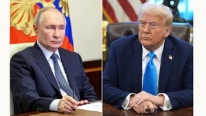 Tổng thống Nga Vladimir Putin (trái) và người đồng cấp Mỹ Donald Trump. (Ảnh: TASS)