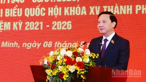 Đồng chí Nguyễn Khắc Định, Ủy viên Trung ương Đảng, Phó Chủ tịch Quốc hội phát biểu tại buổi họp mặt. (Ảnh: THẾ ANH)