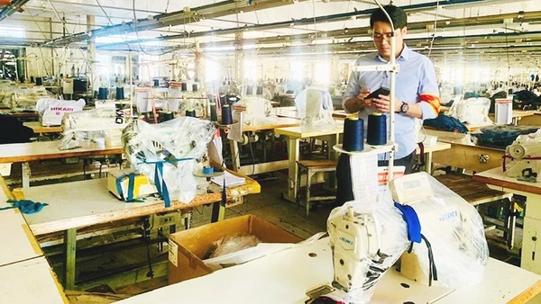 Dây chuyền sản xuất của Công ty May Hai (Thành phố Hải Phòng) bị niêm phong, dừng sản xuất do vướng mắc về nhà, đất theo Kế hoạch 09.