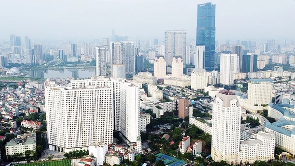 Thị trường M&A bất động sản chưa thật sự bùng nổ do vẫn tồn tại những rào cản lớn. Ảnh: ANH QUÂN